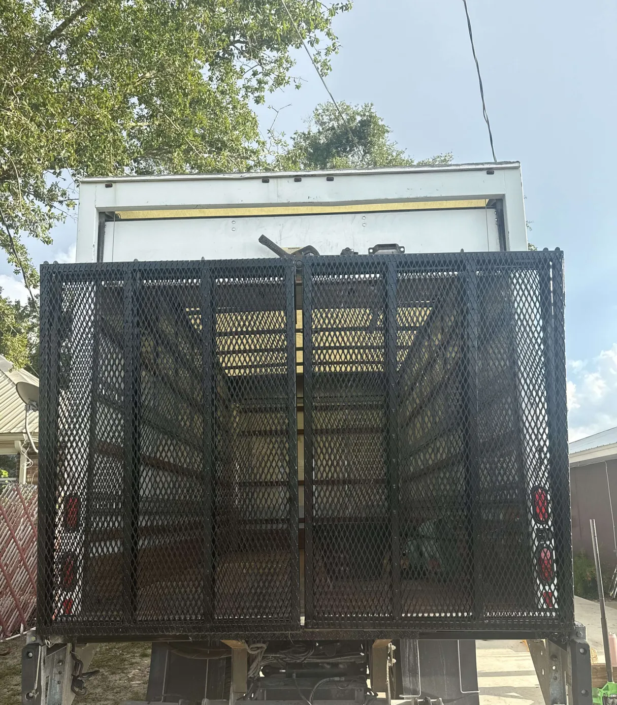 Custom expanded metal security cage fabrication on box truck - Bear Metal Fabrications mobile welding Highlands County FL